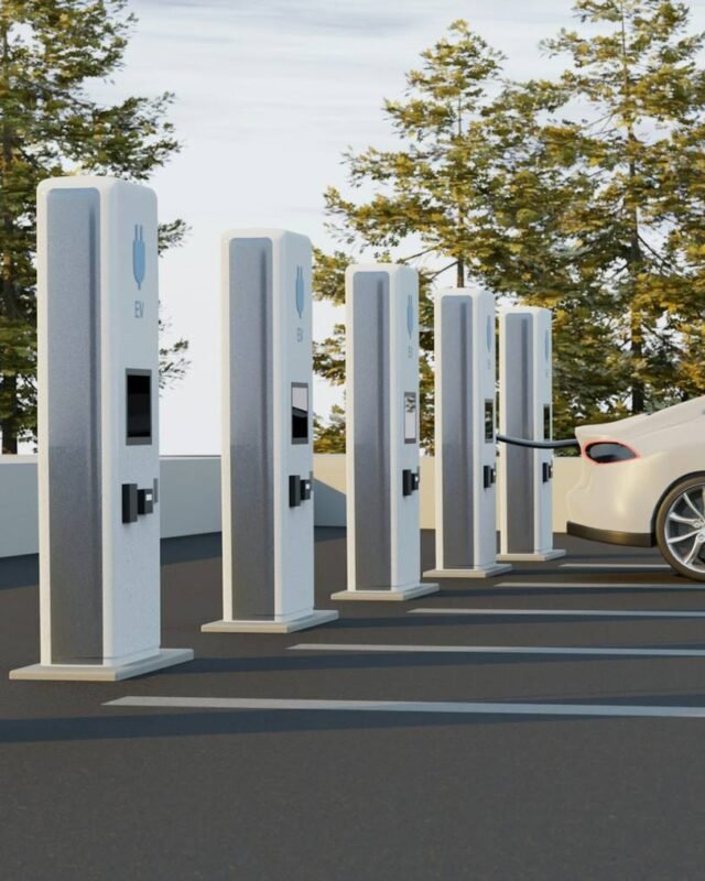 Saudi inter-city EV charging network: A white electric vehicle is charging at a row of EV charging stations amidst trees and a clear sky.